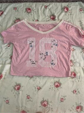 Hollister Pink V-Neck Crop Tee with White '18' and Blue Floral Accents